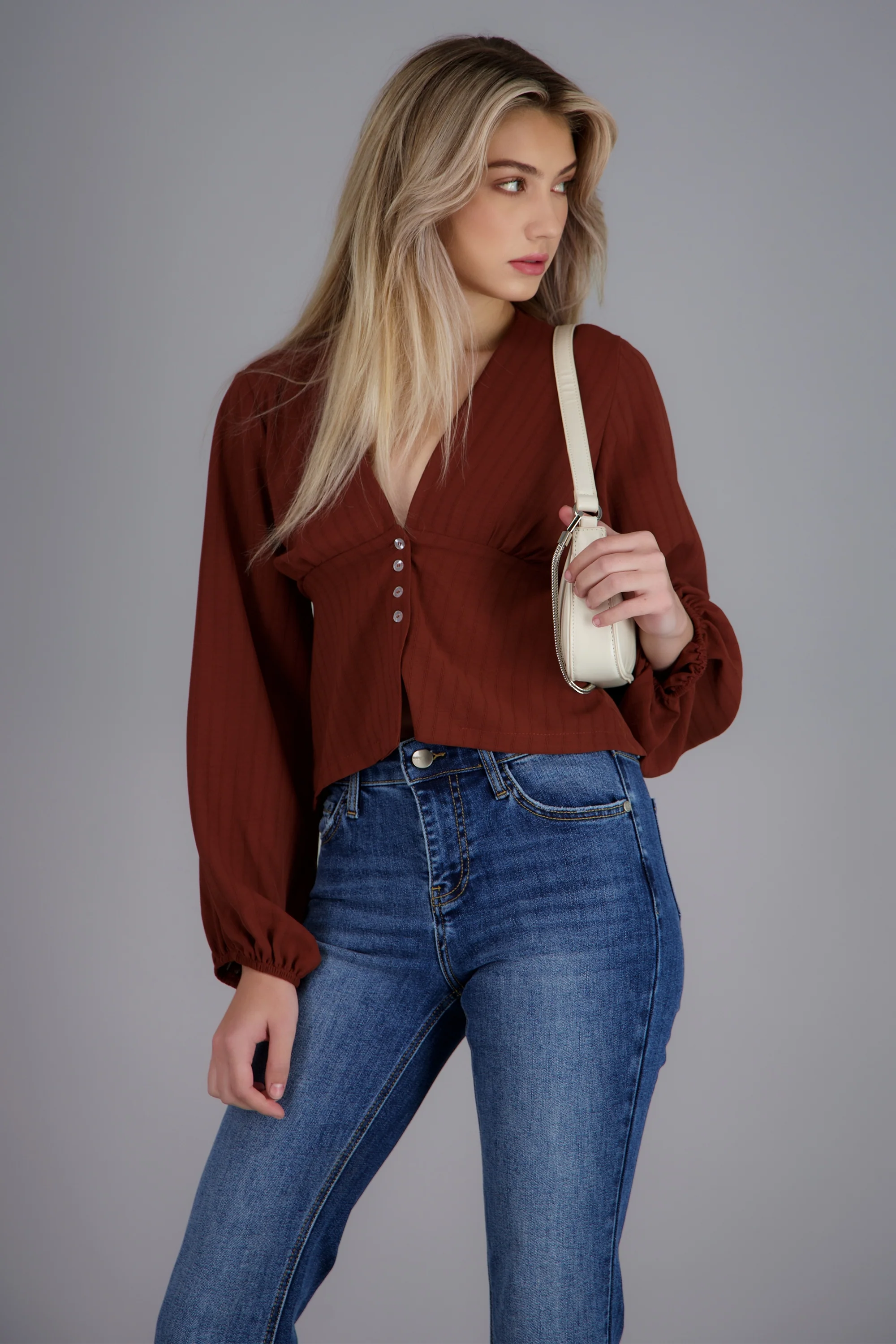 Blusa manga larga abullonada detalle botones