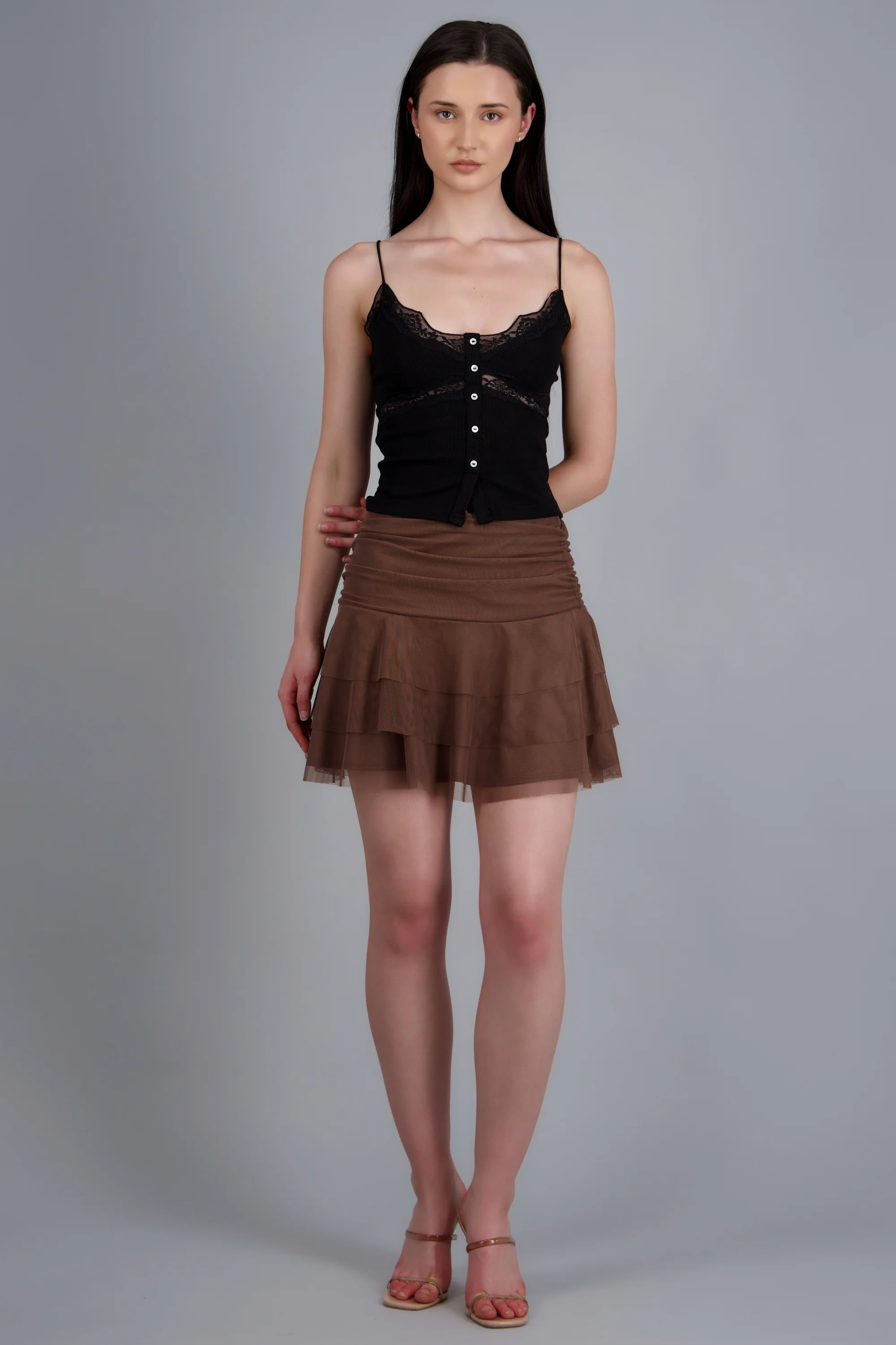 Falda mini triple olan detalle pliegues - Image 3