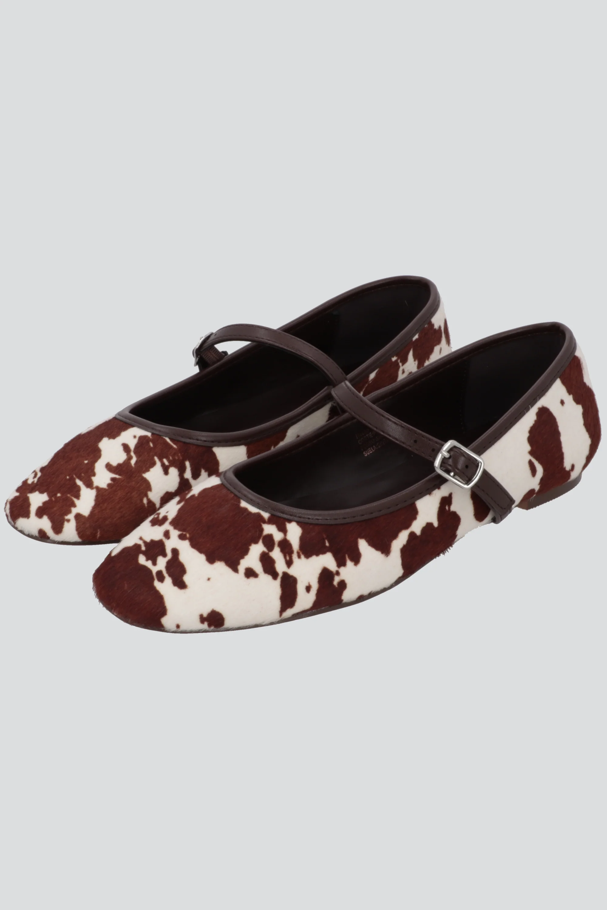 Flat animal print piel