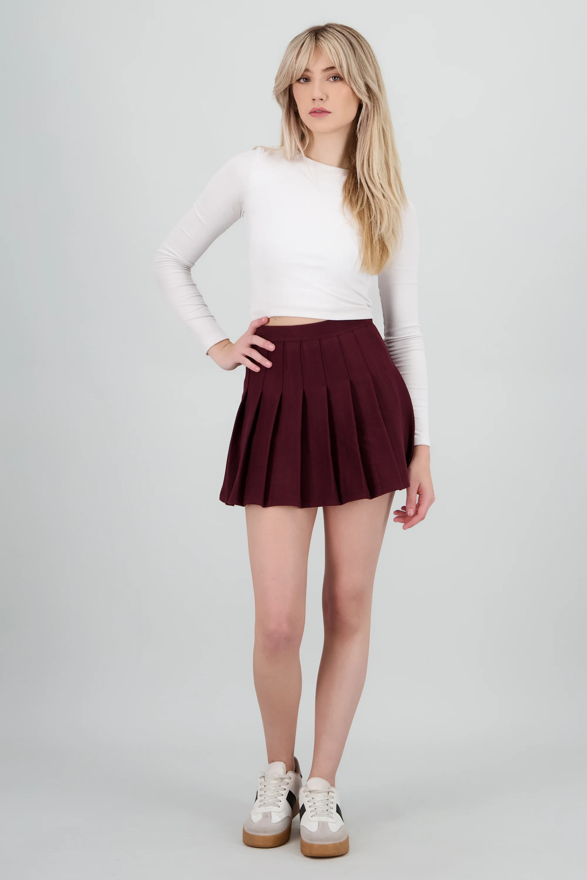 Mini falda tableada lisa