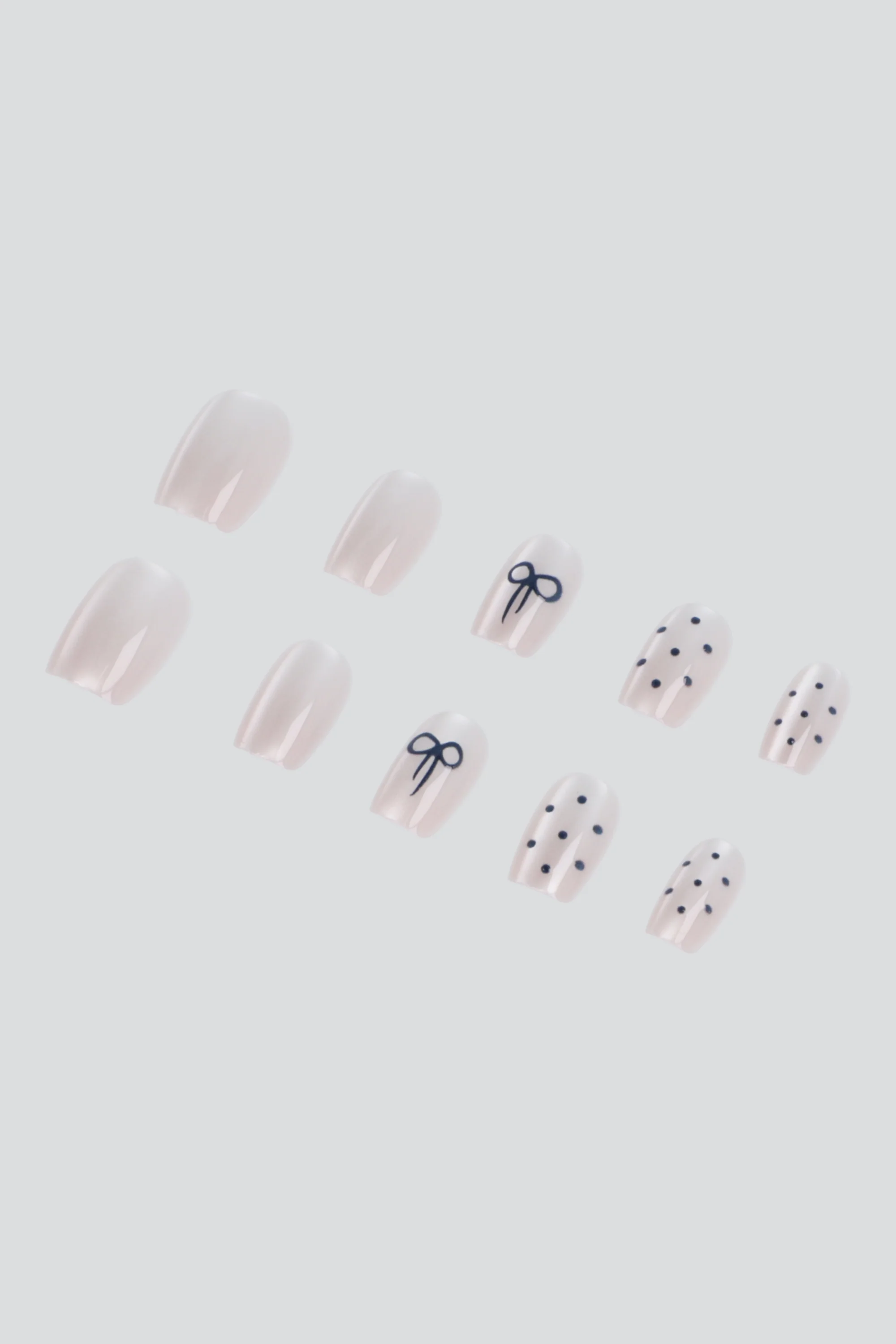 Set 10 uñas polka dots moño ojo de gato - Image 2