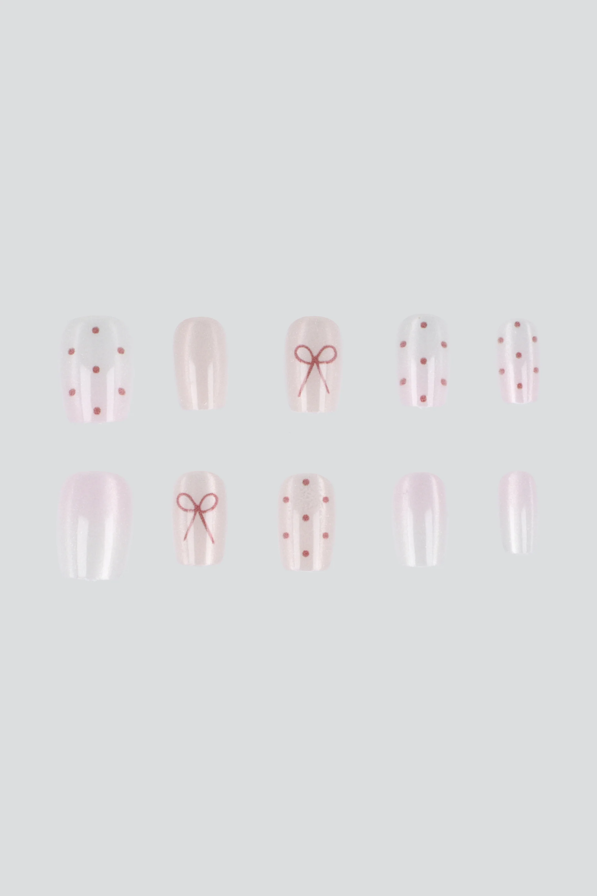 Set 10 uñas polka dots moño ojo de gato - Image 2