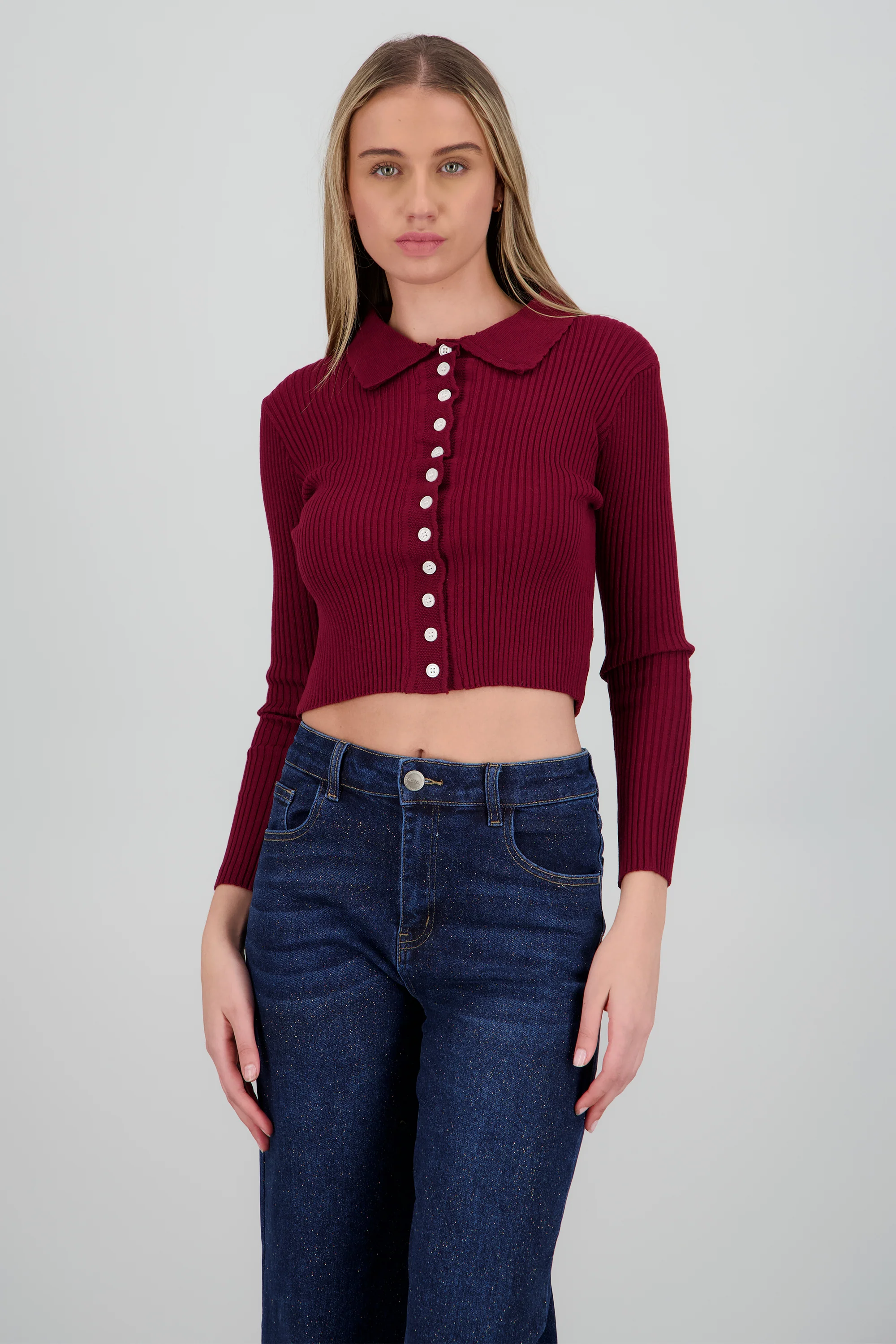 Top tejido tipo polo con botones